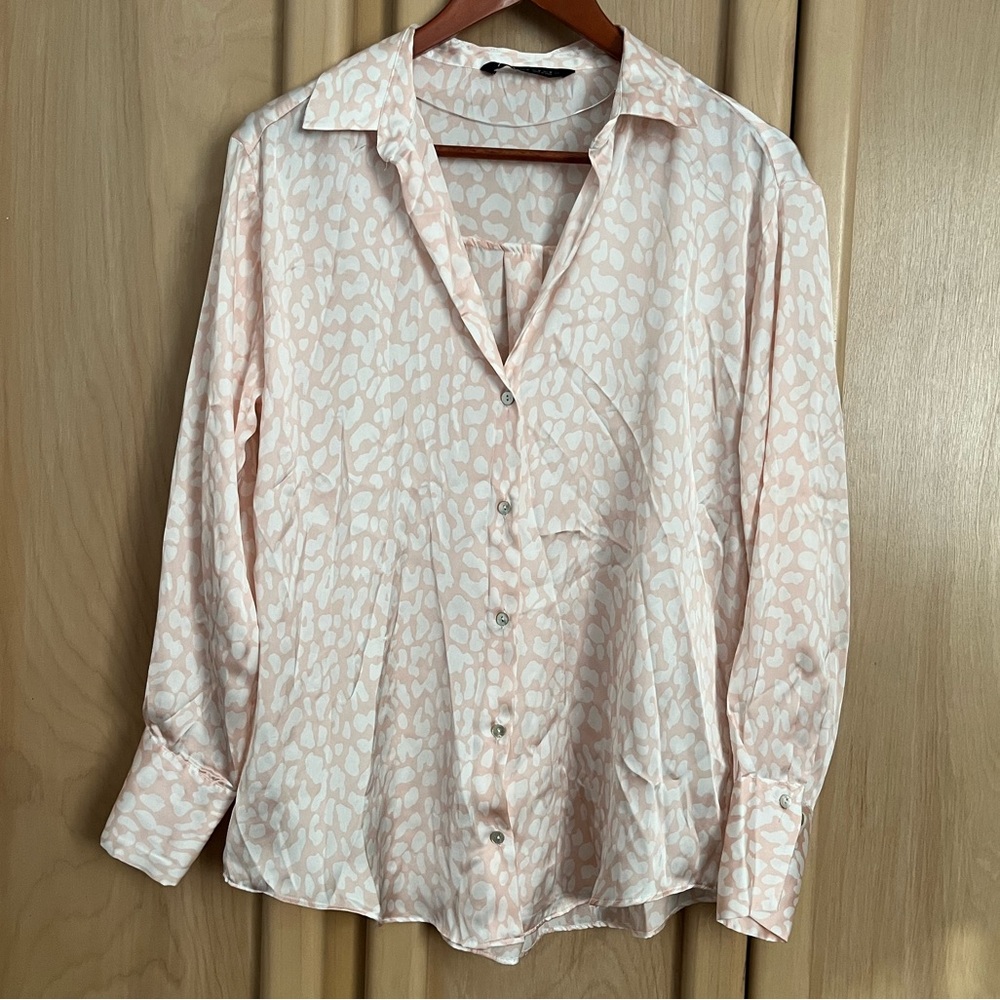 Woman’s Zara pink leopard print satin blouse